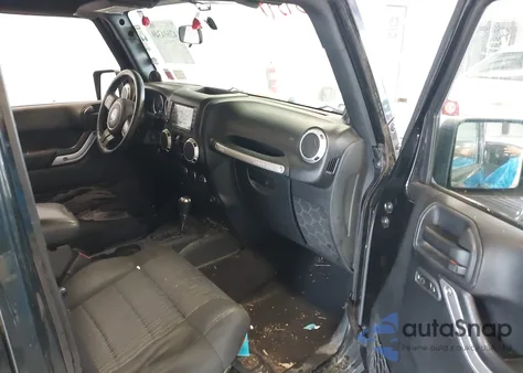 2011 Jeep Wrangler Unlimited Sahara from USA, damaged, VIN 1J4HA5H11BL533237